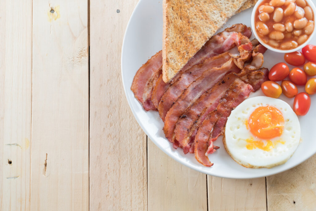 Smoked Honey-Cured Hickory Bacon Is Produced in Scheduled Batches