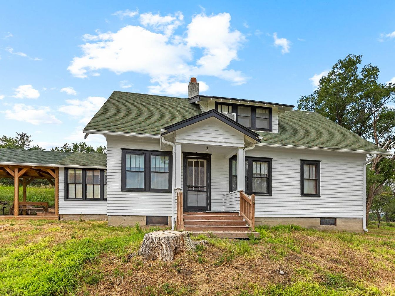 Charming 1900 Homestead in Nebraska with 413.61 Acres, Hunting Potential, and a Front Porch Ideal for Seasonal Getaways