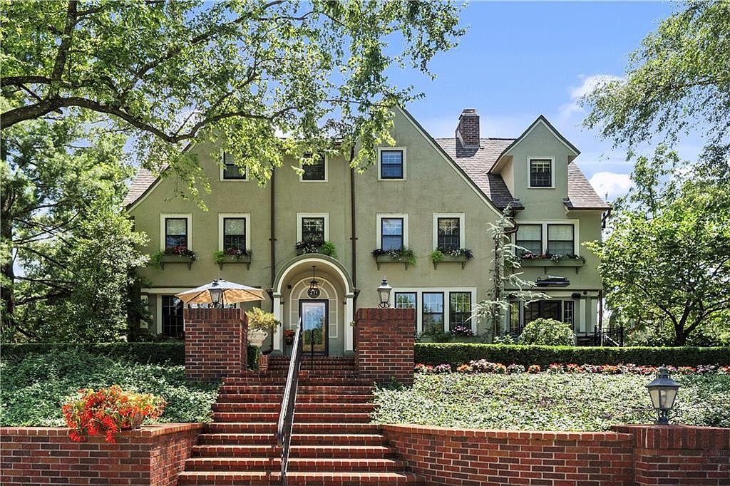 Iconic 1915 Architectural Gem in Kansas City, Missouri, Featuring Loose Park Pond, Six Bedrooms, a Gunite Pool and Hot Tub