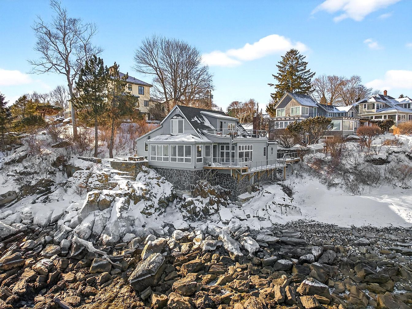 Stunning 1920 Coastal Retreat in South Portland, Maine, Featuring Waterfront Views, Multiple Living Spaces, and a Private Beach