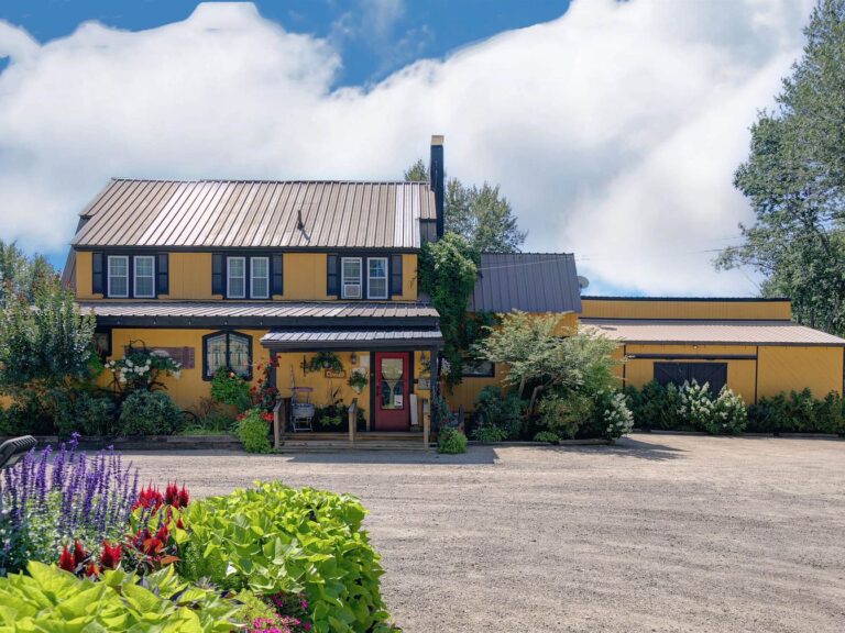 Unique 1926 Colonial Gem in North Conway, New Hampshire, with Mountain Views and an Expansive Barn Awaiting Your Vision