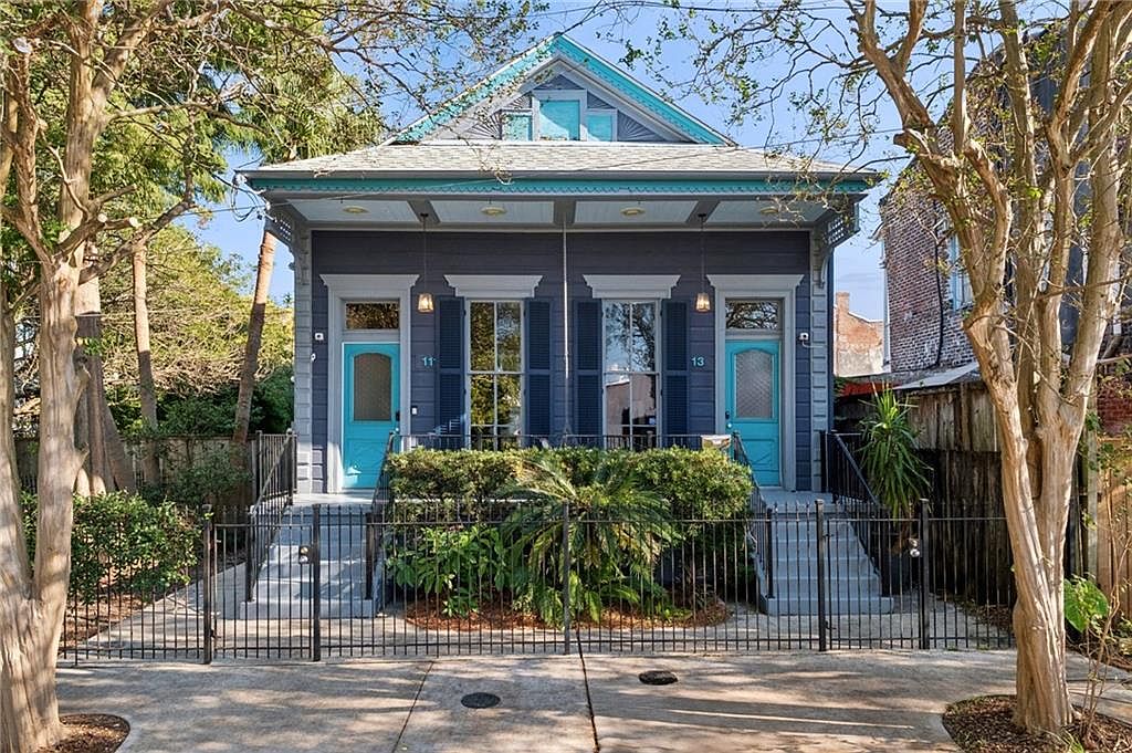 1922 District Home in New Orleans, Louisiana, Featuring 13′ Ceilings, Antique Charm, and an Endless Pool for Entertaining