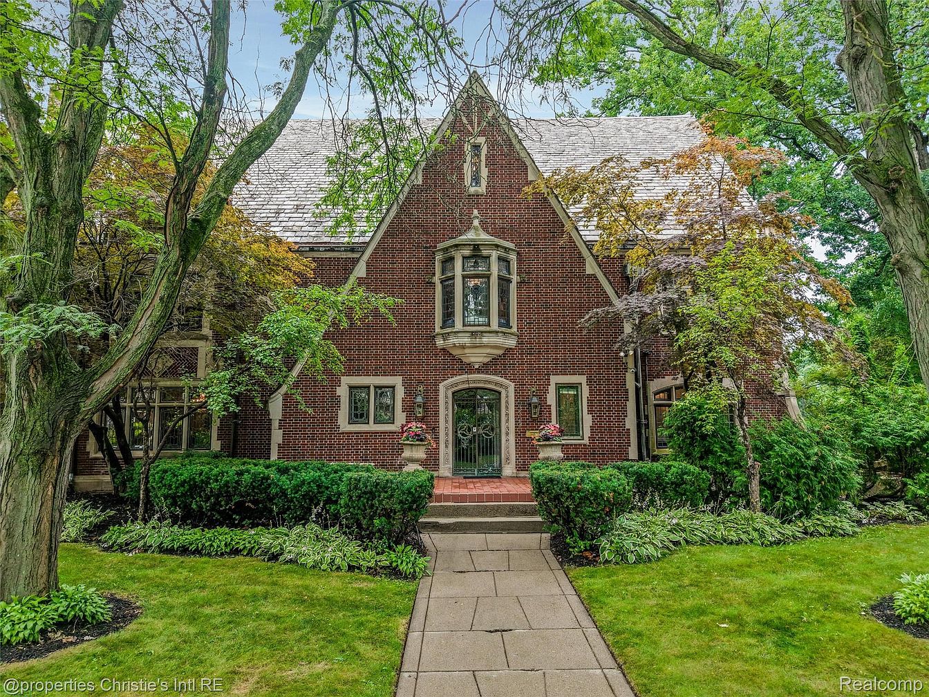 Grandeur of a 1928 Tudor Home in Detroit, with Exquisite Glass Windows, a English-Style Pub, and a Stunning Private Pool