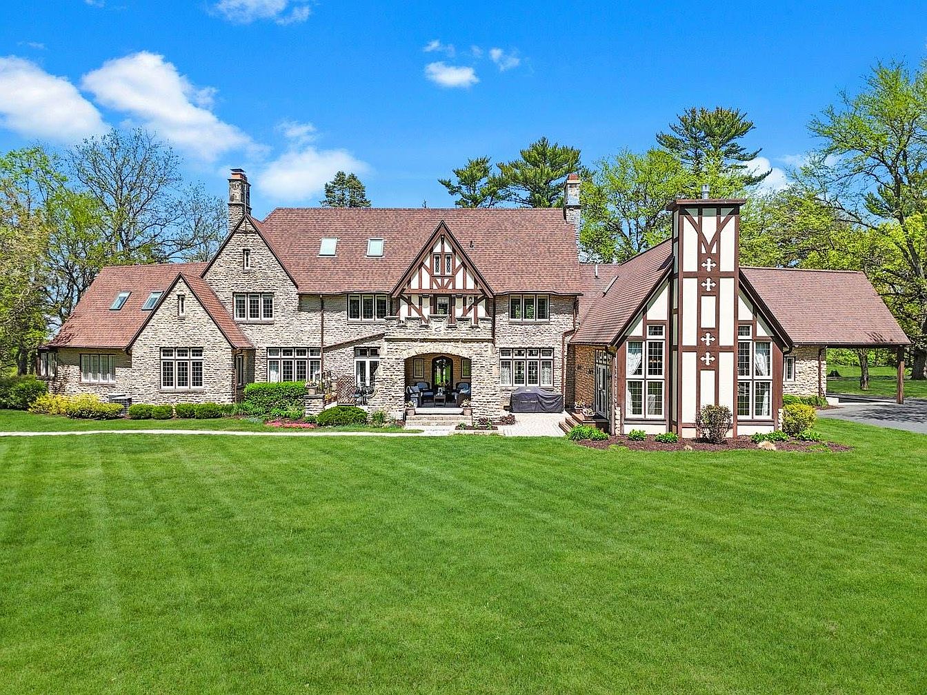 Luxurious 1925 Tudor Estate in Freeport, Illinois, Nestled on 14 Acres with an Indoor Pool and Impressive Basketball Court