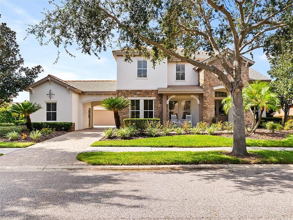 $2M Resort-Style Living in Lutz, Florida, Featuring a $500K Outdoor Oasis with Lagoon-Style Heated Pool and Chef’s Kitchen