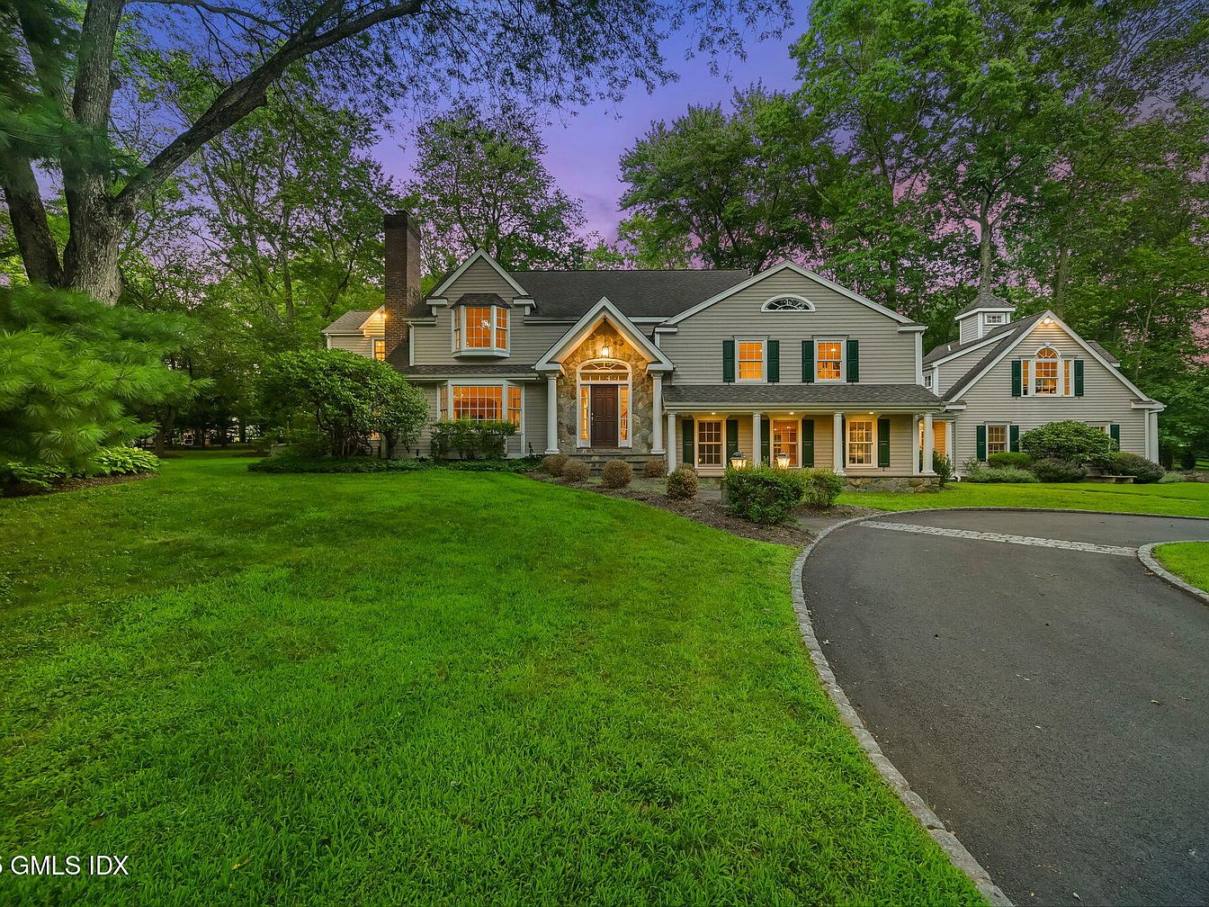 $5M Elegance in a Spacious Residence in Greenwich, Connecticut, with 5 Luxurious Bedrooms, Expansive Gardens, and Cozy Fireplaces