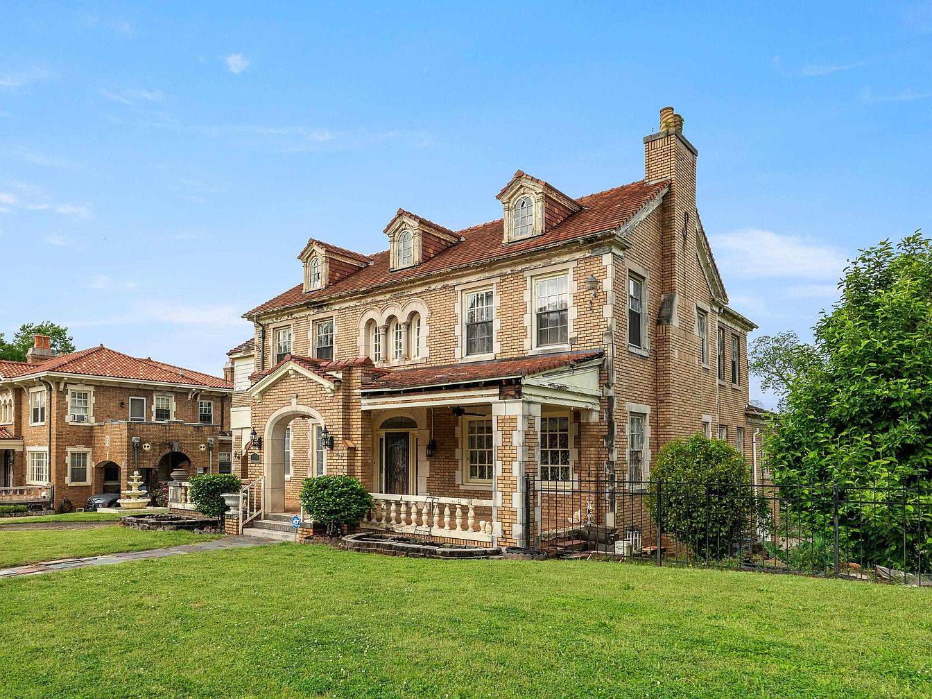 1930 Stately Manor in Bessemer, Alabama: A Historic Schilleci Home with Exquisite Glass Windows and Timeless Craftsmanship