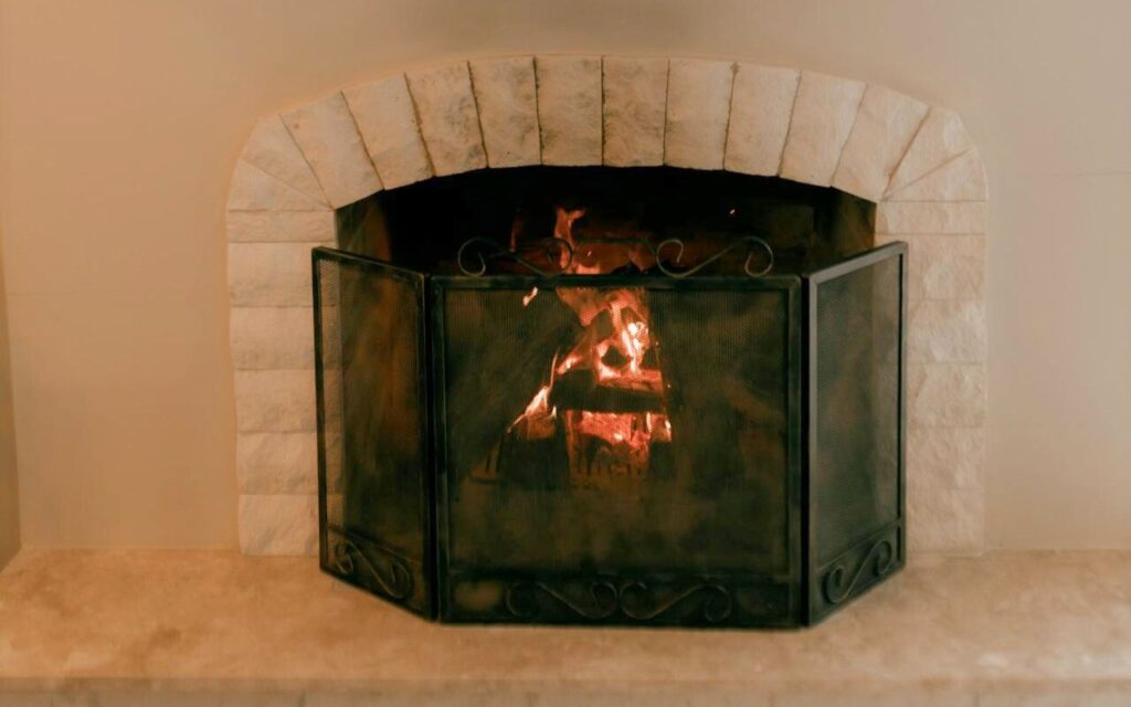 Carved Fireplace Screens That Require a Ladder to Dust