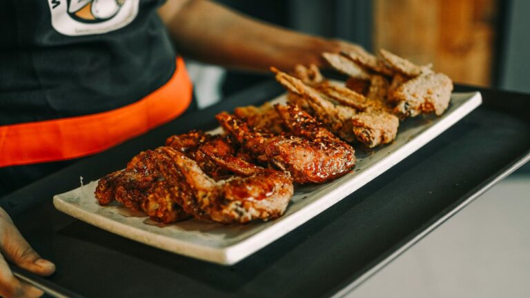 10 Regional “Dive Bar” Wings Bartenders Know Came Frozen