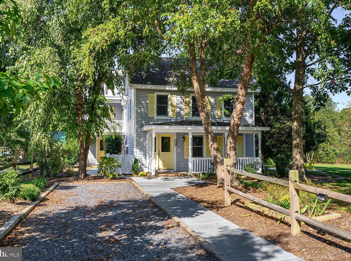 Charming 1900 Waterfront Home in Tilghman, Maryland, Featuring a Circular Staircase, Gourmet Kitchen, and Black Walnut Cove