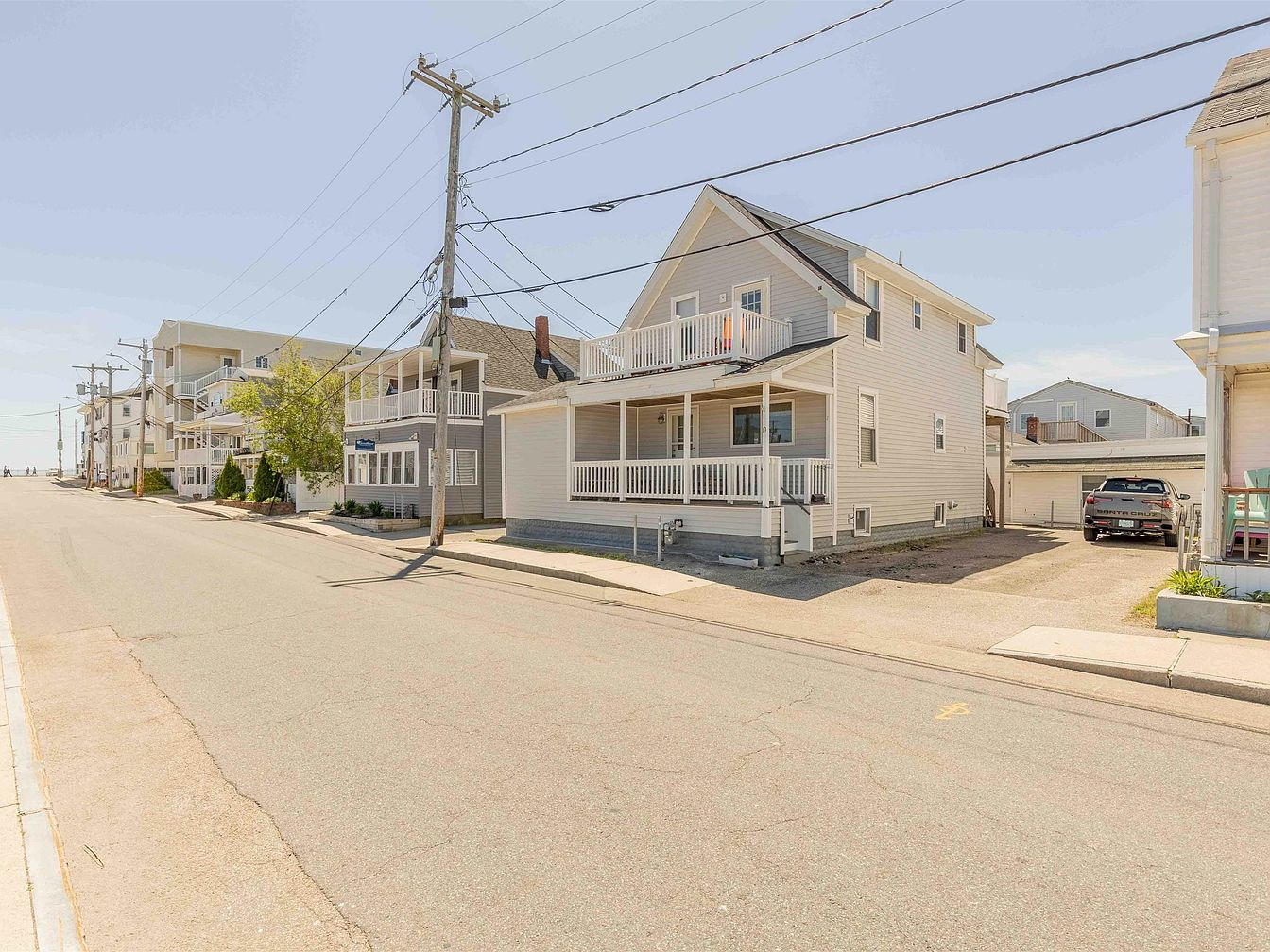 1920 Multi-Unit Property in Hampton, New Hampshire, Steps from the Beach with Tasteful Updates and Potential for Passive Income