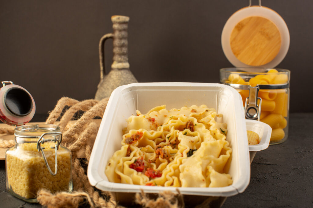 Creamy baked mac and cheese with crispy golden breadcrumb topping in a white casserole dish