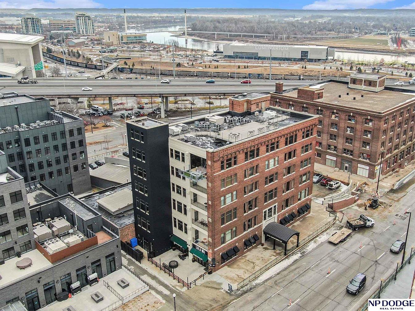 Discover a Spacious 1920 Condo in Omaha, Nebraska with 10-Foot Ceilings, a Private Balcony, and Stunning Rooftop Views