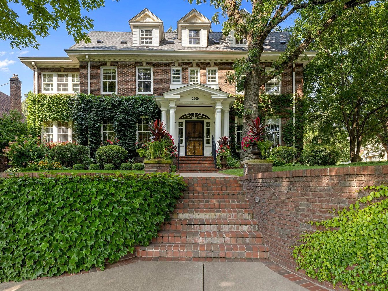 Stunning 1916 Lakeside Retreat in Minneapolis, Minnesota, Featuring Lake Views, a Custom Kitchen, and 2009-2010 Expansion