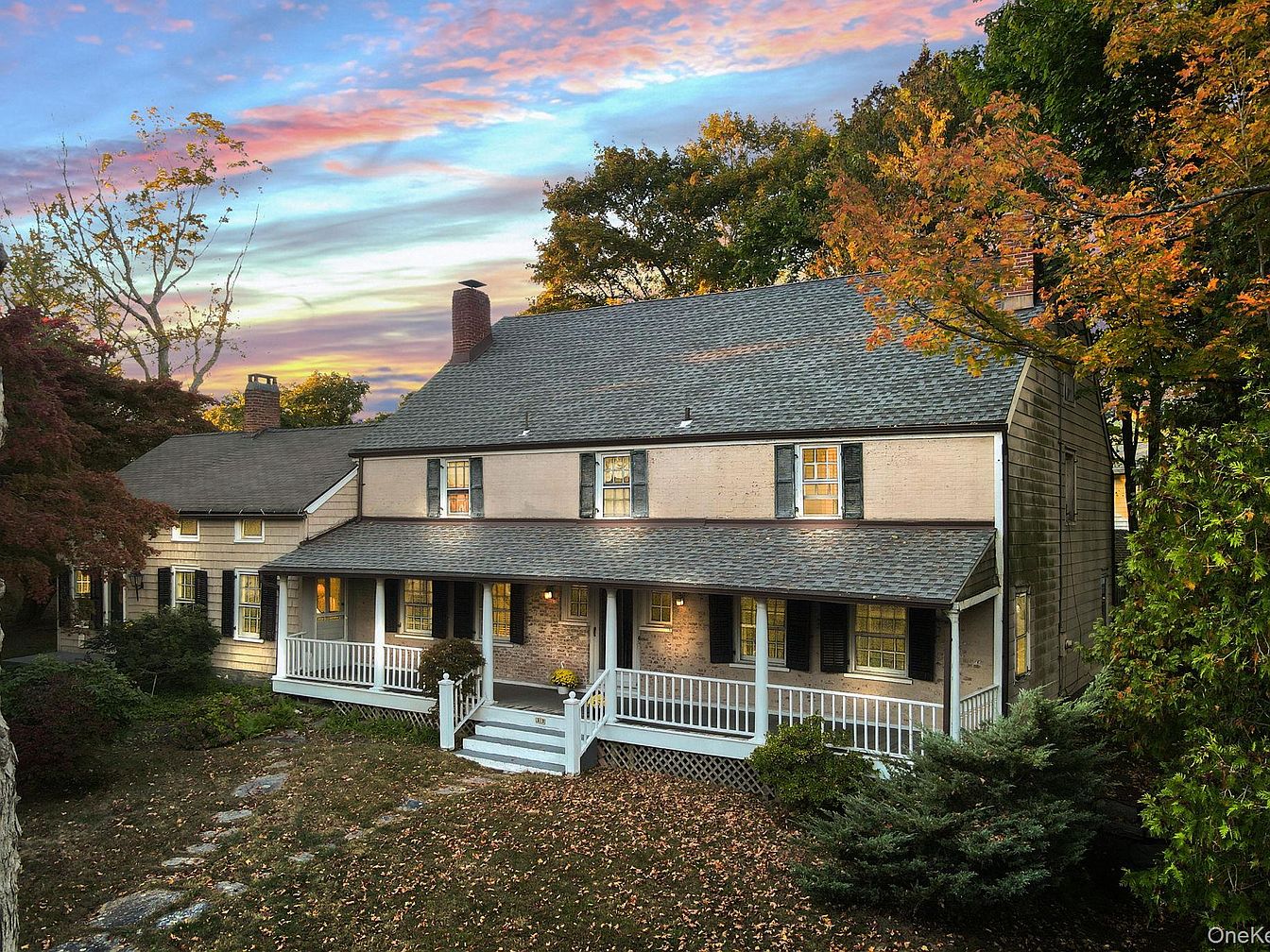 Charming 1826 Colonial Farmhouse in Ossining, New York with Three Fireplaces, Expansive Attic, and Nearly an Acre of Pristine Land