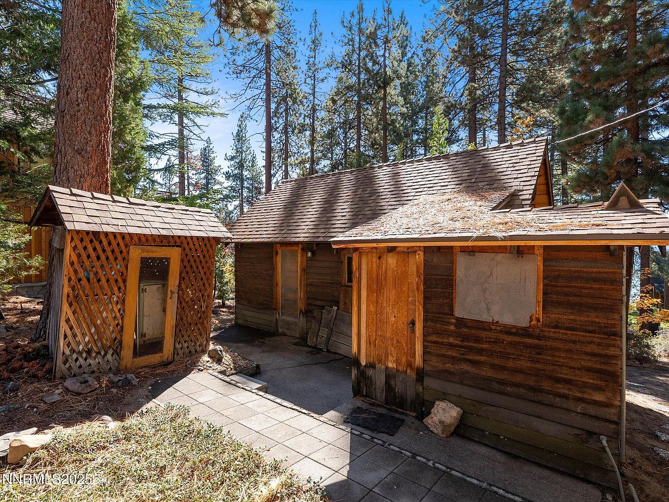 Serene 1930 Lakefront Retreat in Zephyr Cove, Nevada Featuring Two Authentic 1920s Cabins, Lake Views, and Beach Access