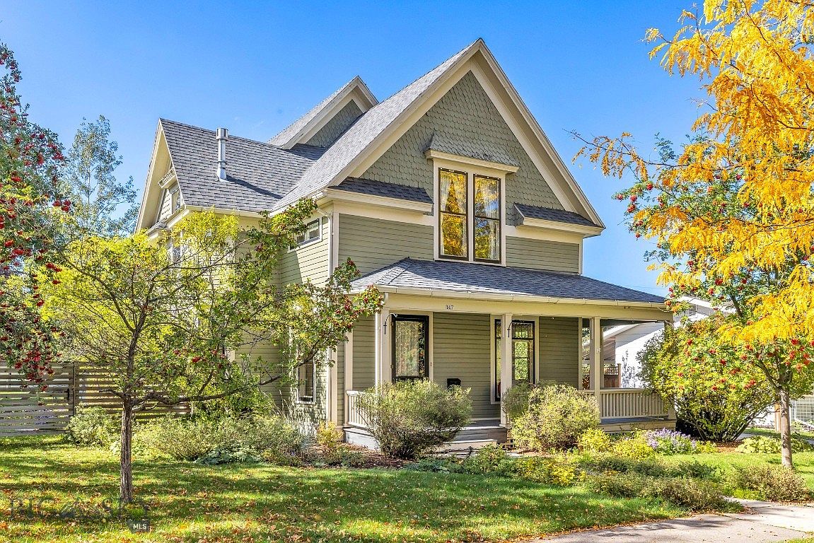 Unveil a 1900 Historic Home in Bozeman, Montana, Exuding Vintage Elegance with Glass Windows and an Enchanting Backyard