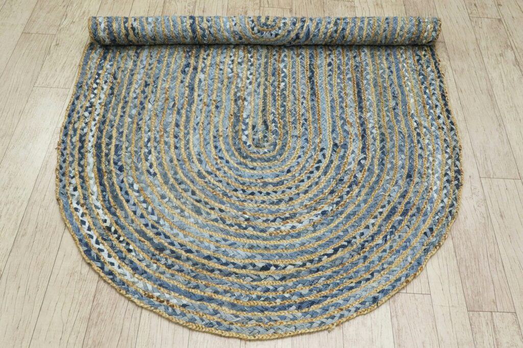 Thick cotton braided rug showing raised outer loops that can catch small feet