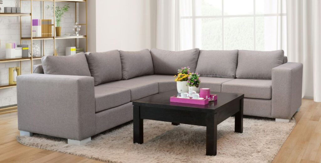 Leather couch seat cushions showing subtle creases and color changes along seams