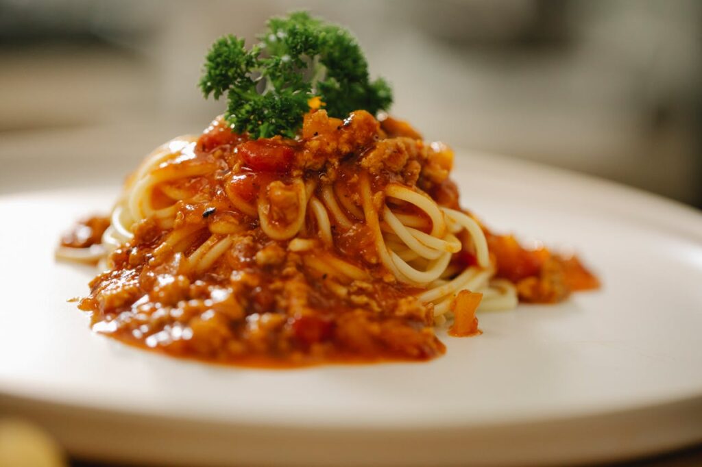 “Slow-Simmered” Bolognese Served With Factory Pasta
