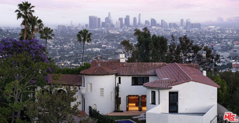 $7.5M Spanish Colonial Home in Los Angeles, Featuring Custom Stained Glass, Vaulted Ceilings, Tennis Court, and Swimming Pool