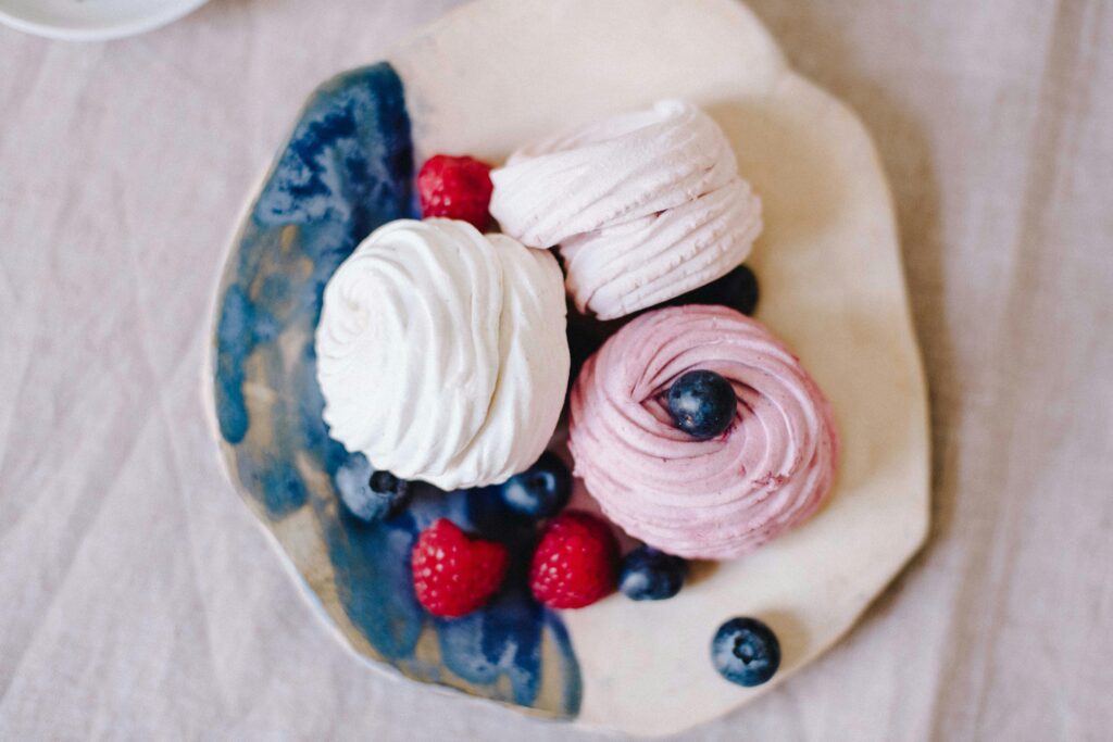 Berry Pavlova with Meringue Nests