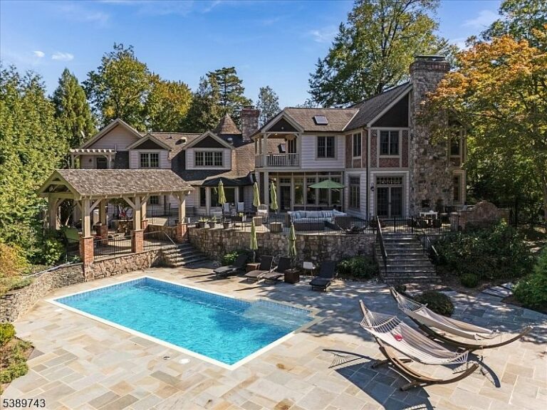 Lavish 1929 Lakefront Living in Sparta, New Jersey With a Stunning Gourmet Kitchen, Resort-Style Pool, and 90 Feet of Water Access