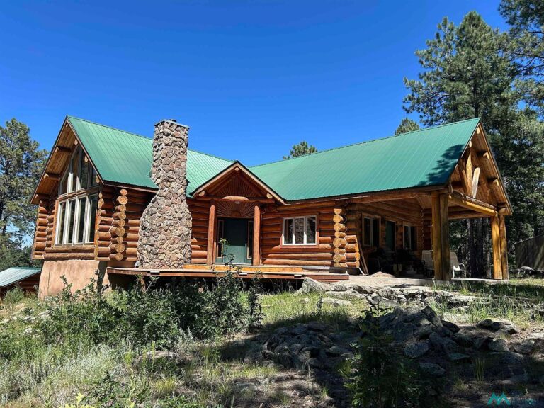 Serene 2001 Custom Log Cabin Retreat in Sapello, New Mexico, Nestled on 137 Acres with Panoramic Views and a Handcrafted Sauna