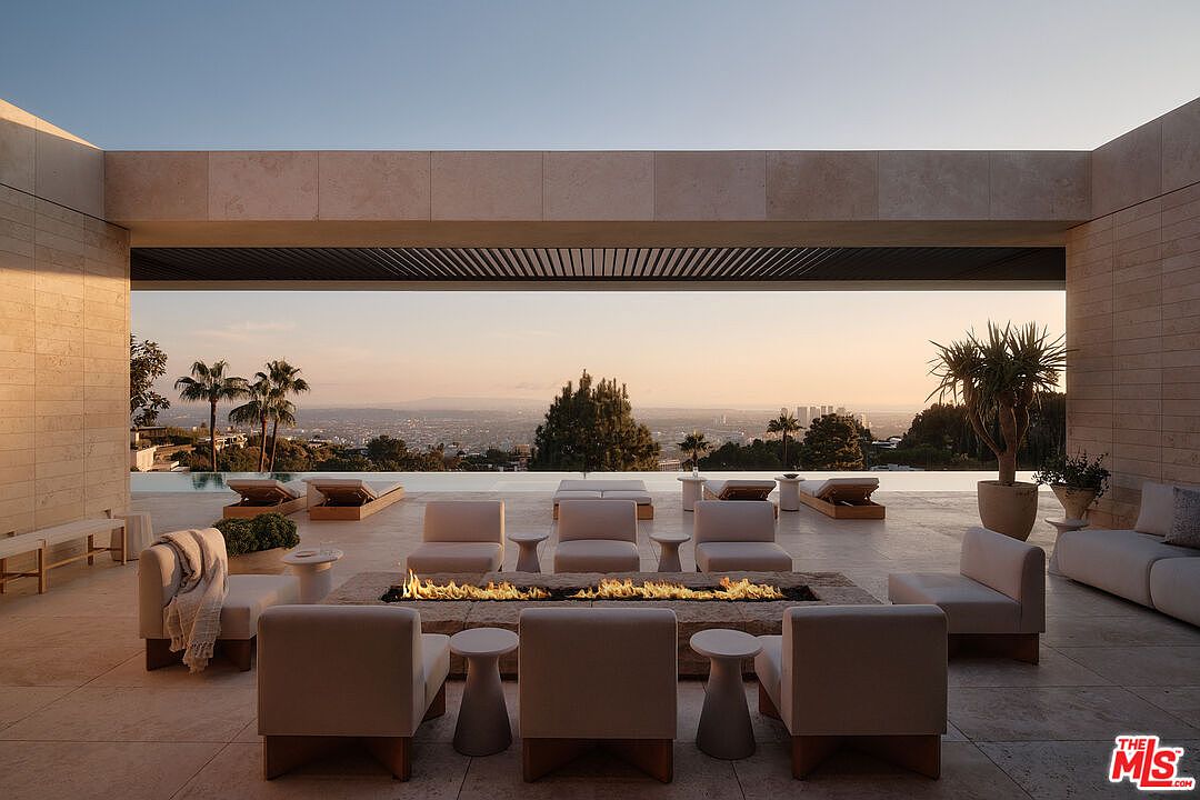 $57M Modern Estate in Los Angeles, Featuring 280-Degree Views, a 115-Foot Pool, and a Two-Story Glass with a 35-Foot Jacaranda Tree