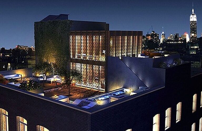 1906 Urban Loft-Style Apartment in New York, Featuring High Beamed Ceilings, Luxurious Finishes, and Access to Exclusive Amenities