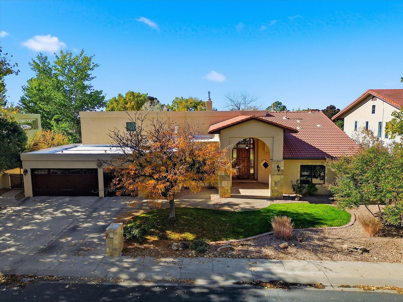 Discover a 1987 Architectural Gem in Albuquerque, New Mexico, featuring Venetian Plaster Walls, Stone Finishes, and High Ceilings