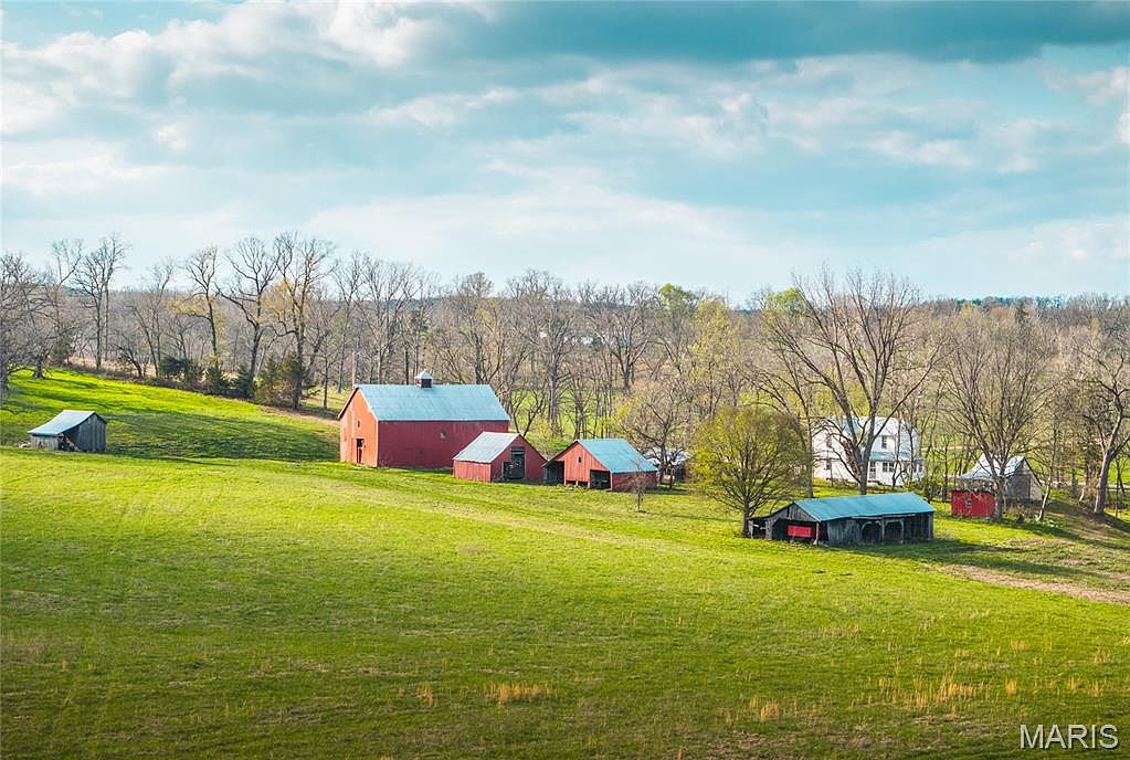 Historic 1926 Farmstead in Vienna, Missouri, Nestled on 121.5 Acres with Scenic Maries River Frontage and Rich Heritage