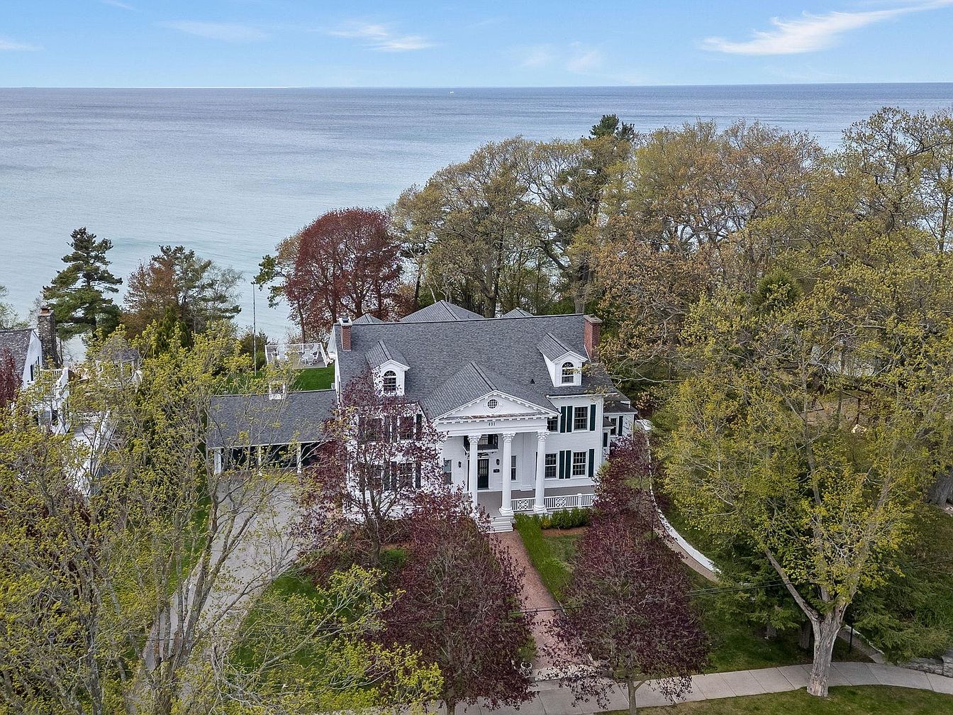 1912 Greek Revival Estate in Charlevoix, Michigan, Featuring Lake Michigan Views, Corinthian Columns, and a Private Beachfront