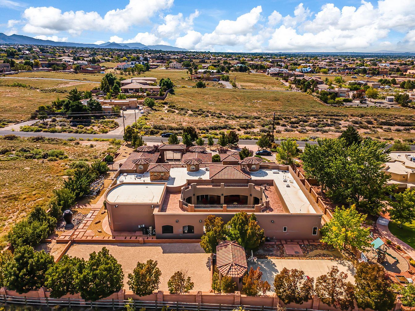 $3M Custom-Built Estate in Albuquerque, New Mexico Featuring Chiseled Travertine Floors, a Resort-Style Courtyard, and a Media Room