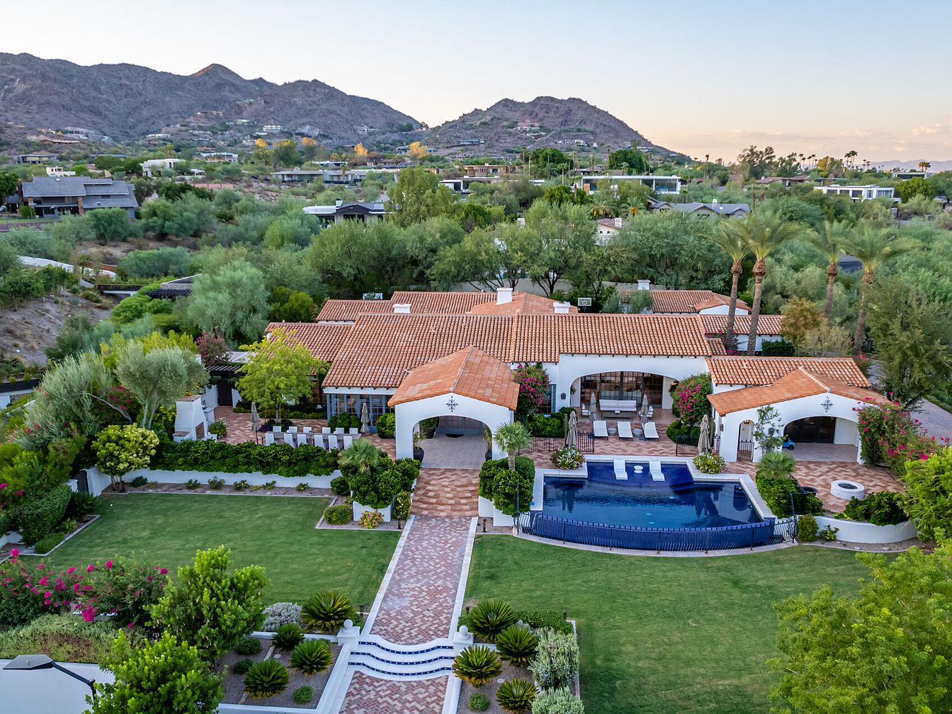 $15M Resort-Style Living in Paradise Valley, Arizona with Camelback Mountain Views, a Guest House, Tennis Court, and Exquisite Spaces