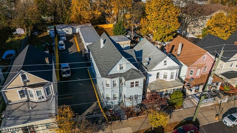 Spacious 1930 Two-Family Home in Passaic, New Jersey, Featuring Abundant Parking and Perfect for Investment Opportunities