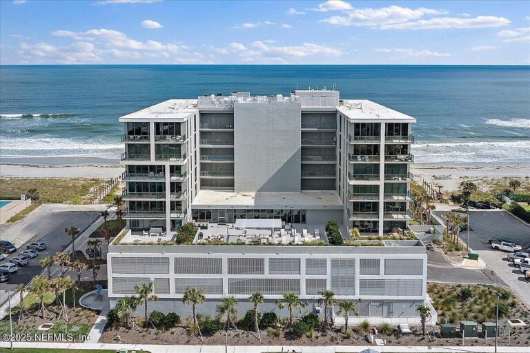 2024 Oceanfront Condo in Jacksonville Beach, Florida, Featuring Soaring Ceilings, Gourmet Kitchen, and Resort-Style Amenities