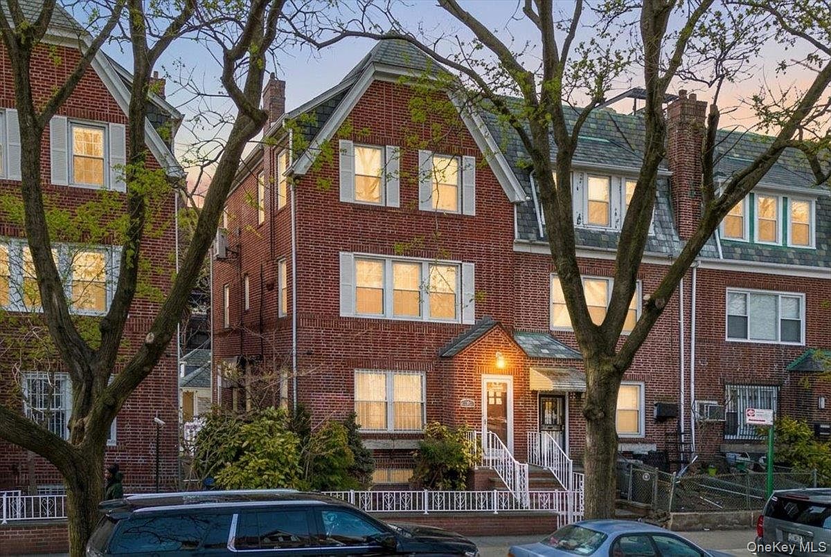 Charming 1930 Brick Home in Jackson Heights, New York with Classic Wood Floors, a Finished Basement, and Rare Parking Convenience