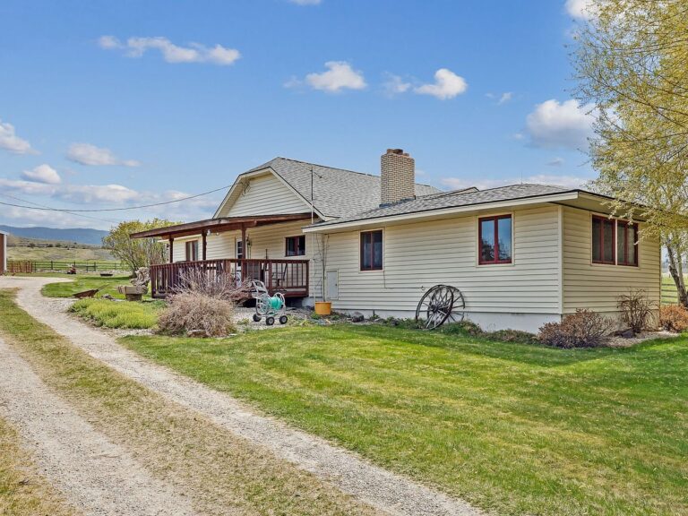 Enchanting 1930 Farmhouse in Corvallis, Montana, Nestled on 60 Acres with Sweeping Mountain Views and Room for Horses and Gardens