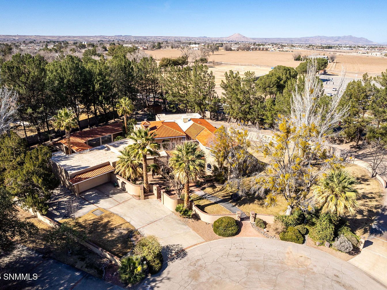 Unveil a 1984 Estate in Mesilla, New Mexico, featuring 4 Bedrooms, 5.5 Bathrooms, and a Chef’s Kitchen set on a Gated Community