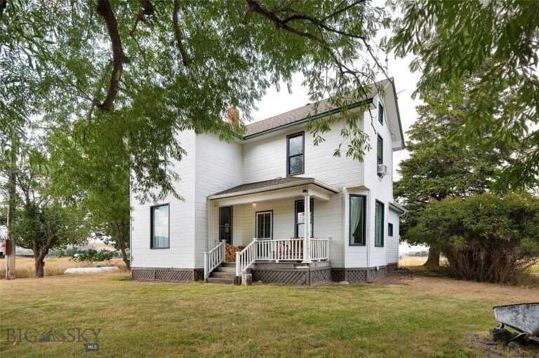 Picturesque 1914 Farmhouse in Gallatin Gateway, Montana, with Breathtaking River Access and 22.6 Acres of Hobby Farm Potential