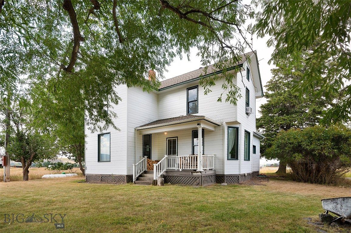 Picturesque 1914 Farmhouse in Gallatin Gateway, Montana, with Breathtaking River Access and 22.6 Acres of Hobby Farm Potential