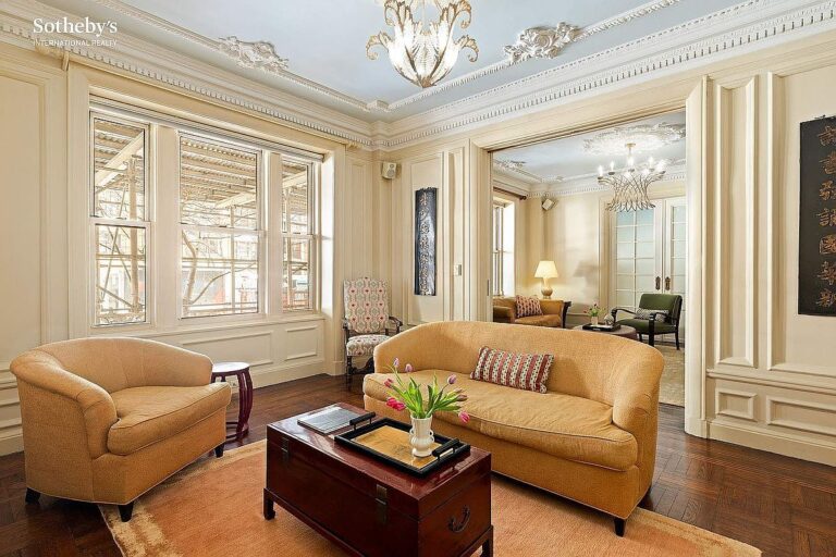 Timeless 1909 Prewar Condominium in New York, Featuring Ornate 10-Foot Ceilings, a Cozy Library, and Expansive Living Spaces