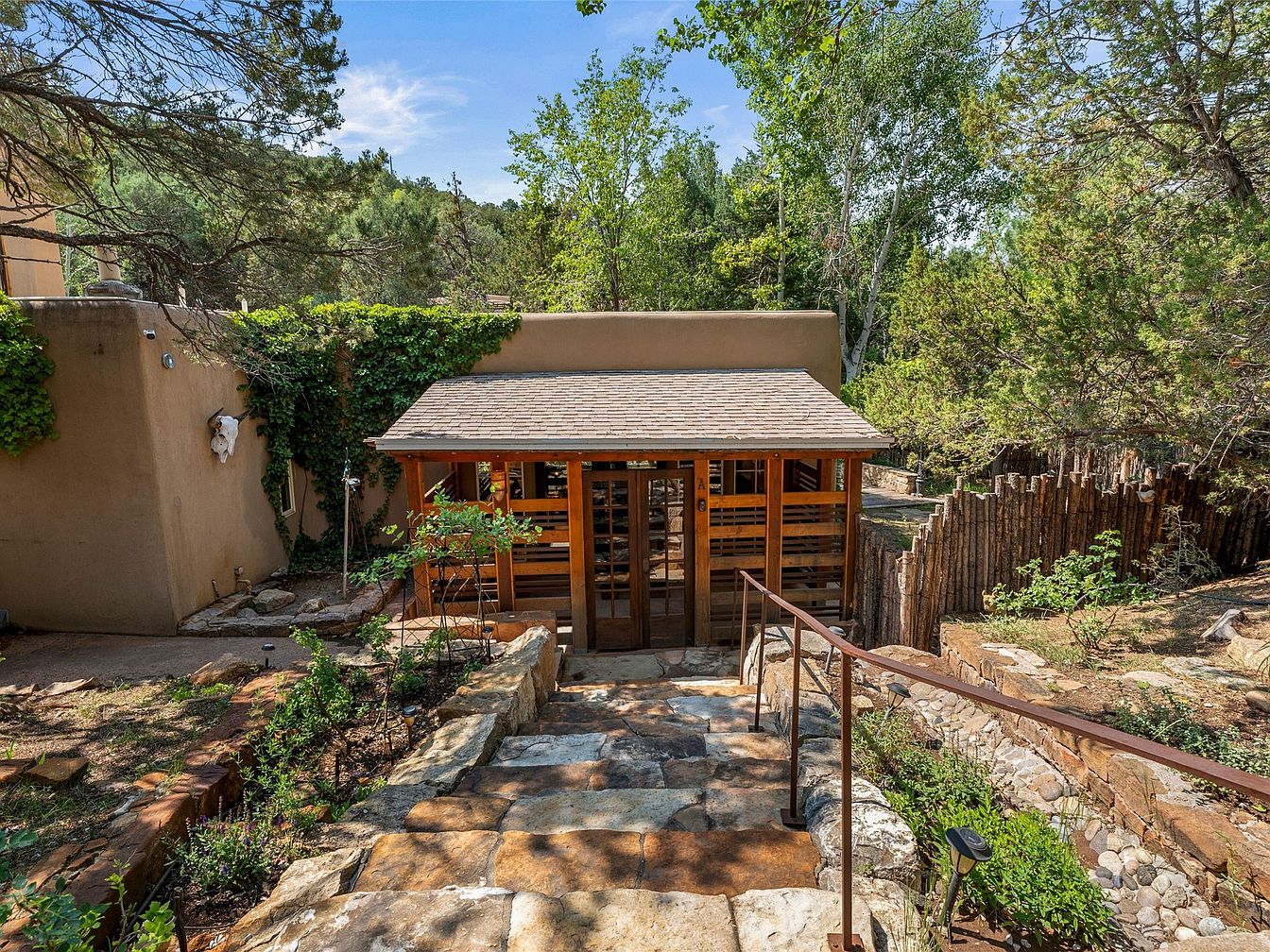 Charming 2002 Santa Fe Retreat in New Mexico with Imported French Features, Dual Living Spaces, and Just Miles from the Ski Basin
