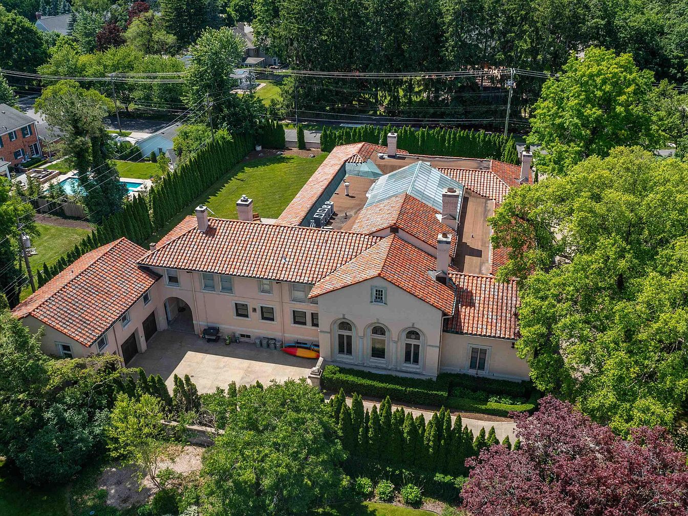 Grandeur of a 1927 Architectural Masterpiece in Grosse Pointe Farms, Michigan, Featuring a Spectacular Atrium with a 27 ft. Skylight