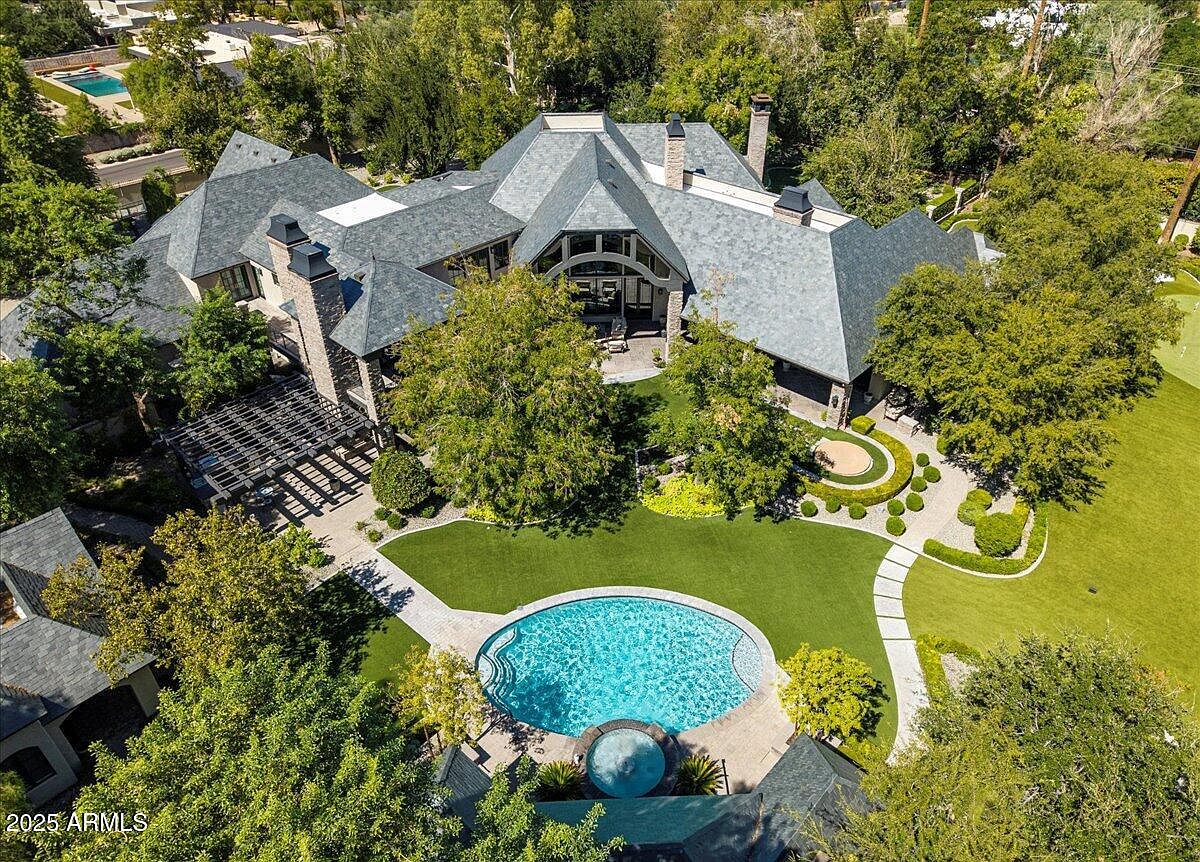 $13M Custom-Built Paradise in Phoenix, Arizona, Featuring 7 Ensuite Bedrooms and an In-House Theater Amidst 2 Acres of Grounds